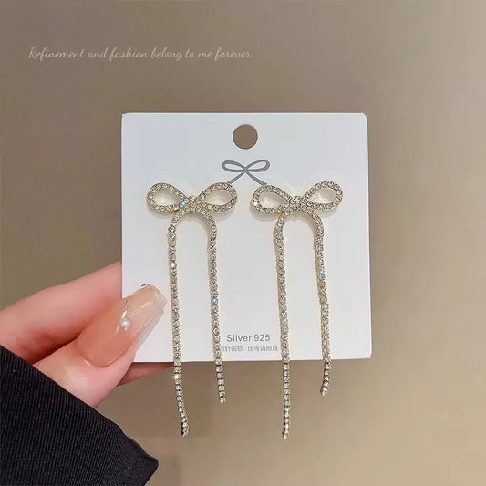 bow-shaped drop earrings